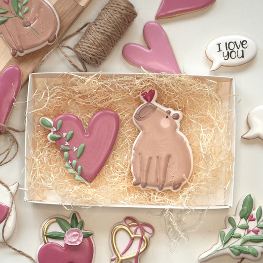 Capibara con cuore fiorito